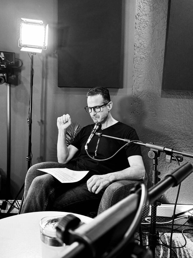 Marc Kantor addiction interventionist in New York reviewing notes in a studio